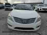 2012 Hyundai Azera с VIN KMHFH4JG4CA193222, выставлен на аукционе Copart как лот 77207034 с пробегом 150 634 миль миль и Списание • Salvage title. История ставок и продаж доступна на DreamBid. Изображение 5.