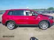 2025 Honda Passport EX-L with VIN 5FNYF8H56SB001075, listed as a IAAI auction lot 42262450 with Not provided miles and . Bid and sale history available at DreamBid. Image 13.