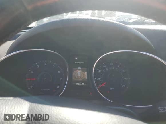 2013 Hyundai Santa Fe Sport z VIN 5XYZUDLA8DG099397, wystawiony jako Copart lot #70285115 z przebiegiem 210 625 mil mil oraz Szkoda całkowita • Salvage title. Historia ofert i sprzedaży dostępna na DreamBid. Obrazek 9.