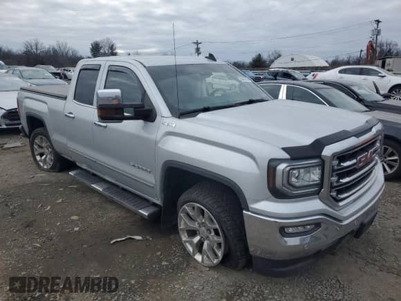 2017 GMC Sierra 1500 SLT z VIN 1GTV2NEJ3HZ300489, wystawiony jako Copart lot #88165705 z przebiegiem 97 878 mil mil oraz Szkoda całkowita • Salvage title. Historia ofert i sprzedaży dostępna na DreamBid. Obrazek 4.