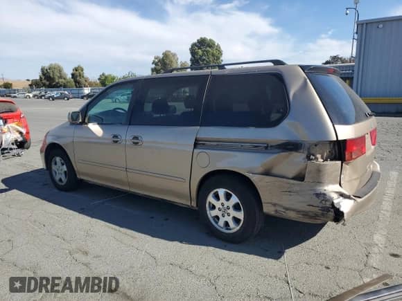 2000 Honda Odyssey EX с VIN 2HKRL1868YH611177, выставлен на аукционе Copart как лот 70207975 с пробегом 138 538 миль миль и Списание • Salvage title. История ставок и продаж доступна на DreamBid. Изображение 2.
