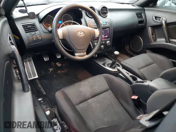 2008 Hyundai Tiburon GS с VIN KMHHM66D48U292160, выставлен на аукционе Copart как лот 84760964 с пробегом 114 878 миль миль и Списание • Salvage title. История ставок и продаж доступна на DreamBid. Изображение 8.