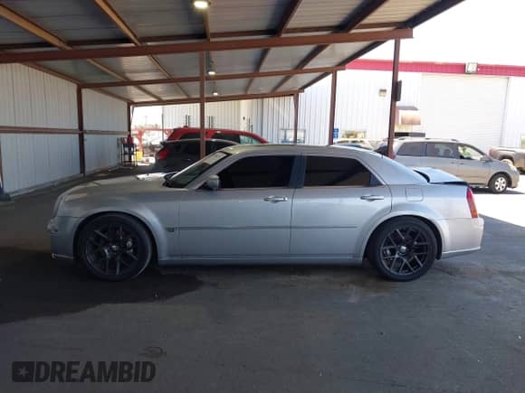 2006 Chrysler 300 C SRT-8 with VIN 2C3LA73W26H471000, listed as a IAAI auction lot 42884335 with 148,180 mi miles and . Bid and sale history available at DreamBid. Image 14.