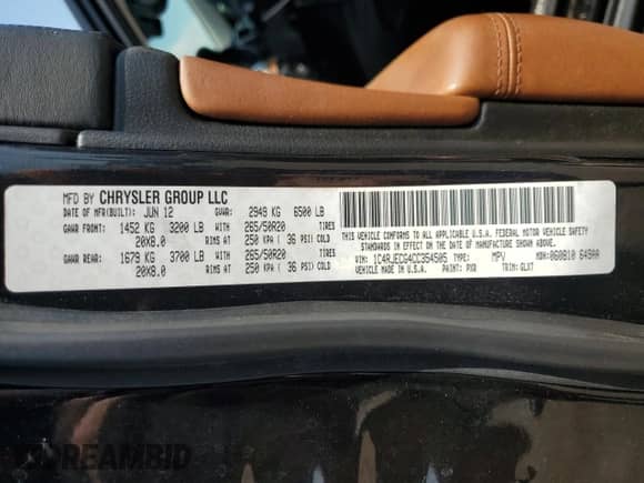 2012 Jeep Grand Cherokee Overland with VIN 1C4RJECG4CC354505, listed as a Copart auction lot 81052135 with 126,523 mi miles and Salvage title. Bid and sale history available at DreamBid. Image 13.