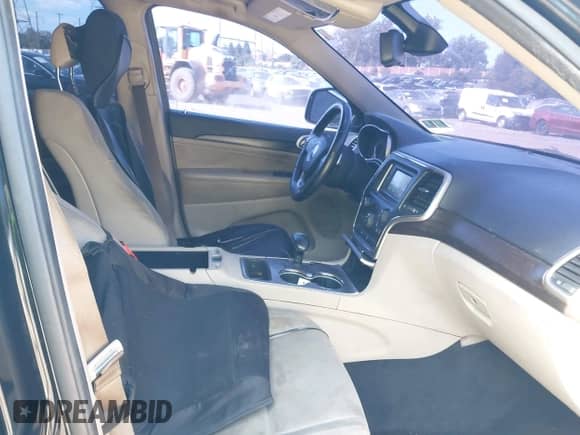 2014 Jeep Grand Cherokee Laredo z VIN 1C4RJFAGXEC255361, wystawiony jako IAAI lot #43383183 z przebiegiem 227 059 mil mil oraz . Historia ofert i sprzedaży dostępna na DreamBid. Obrazek 5.