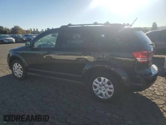 2013 Dodge Journey American Value с VIN 3C4PDCAB1DT722347, выставлен на аукционе Copart как лот 87449465 с пробегом 169 855 миль миль и Чистый • Clean title. История ставок и продаж доступна на DreamBid. Изображение 2.