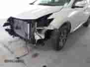 2015 Nissan Murano SV with VIN 5N1AZ2MG8FN216148, listed as a IAAI auction lot 43116345 with 158,415 mi miles and . Bid and sale history available at DreamBid. Image 6.