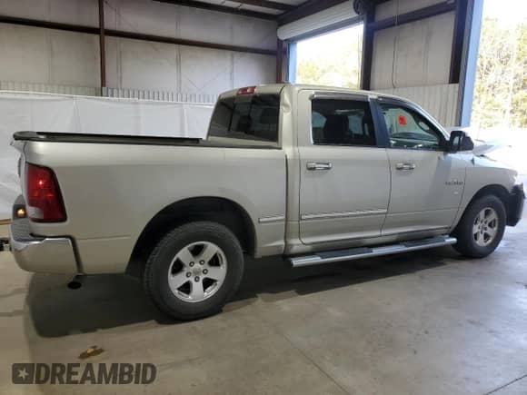 2010 Dodge 1500 SLT с VIN 1D7RB1CP4AS189571, выставлен на аукционе Copart как лот 84385034 с пробегом 151 665 миль миль и Списание • Salvage title. История ставок и продаж доступна на DreamBid. Изображение 3.