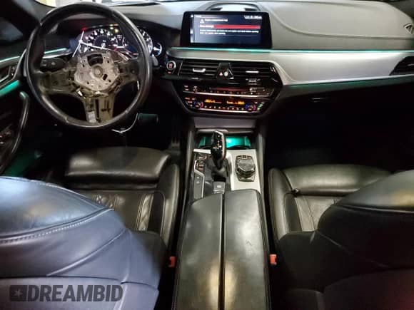 2018 BMW 5 Series M550i xDrive with VIN WBAJB9C51JB034817, listed as a Copart auction lot 69056245 with 132,405 mi miles and Salvage title. Bid and sale history available at DreamBid. Image 8.