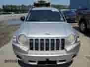 2007 Jeep Compass Sport with VIN 1J8FT47W87D158424, listed as a Copart auction lot 61333865 with 243,861 mi miles and Salvage title. Bid and sale history available at DreamBid. Image 5.