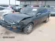 1993 Toyota Camry LE z VIN JT2SK12E2P0184734, wystawiony jako IAAI lot #42673480 z przebiegiem 130 511 mil mil oraz . Historia ofert i sprzedaży dostępna na DreamBid. Obrazek 2.