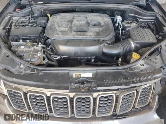 2018 Jeep Grand Cherokee Trailhawk с VIN 1C4RJFLG2JC227951, выставлен на аукционе Copart как лот 81715465 с пробегом 128 266 миль миль и Списание • Salvage title. История ставок и продаж доступна на DreamBid. Изображение 12.