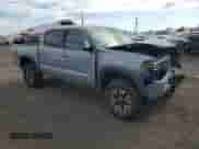 2020 Toyota Tacoma SR5 with VIN 5TFCZ5AN2LX216308, listed as a Copart auction lot 69860245 with 58,698 mi miles and Salvage title. Bid and sale history available at DreamBid. Image 4.
