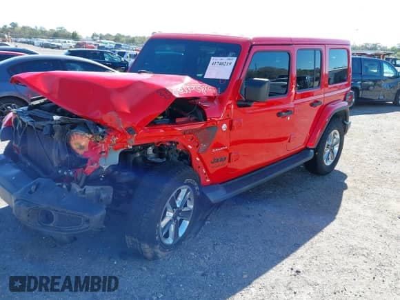 2021 Jeep Wrangler Unlimited Sahara z VIN 1C4HJXEN7MW551848, wystawiony jako IAAI lot #41740219 z przebiegiem 70 608 mil mil oraz . Historia ofert i sprzedaży dostępna na DreamBid. Obrazek 18.