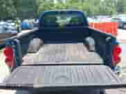 2005 Dodge Dakota SLT with VIN 1D7HW48N25S112499, listed as a IAAI auction lot 42434700 with 216,817 mi miles and . Bid and sale history available at DreamBid. Image 18.