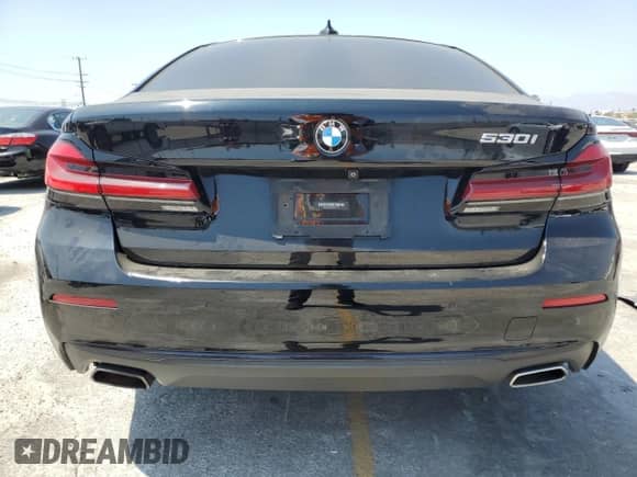 2021 BMW 5 Series 530i with VIN WBA53BH04MWX12136, listed as a Copart auction lot 68948585 with Not provided miles and Salvage title. Bid and sale history available at DreamBid. Image 6.