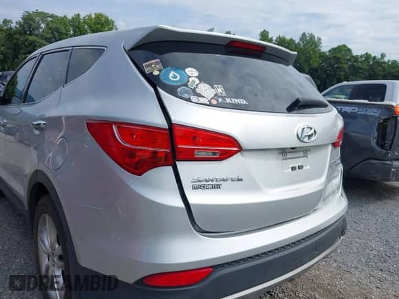 2013 Hyundai Santa Fe Sport z VIN 5XYZWDLA1DG044574, wystawiony jako IAAI lot #42727884 z przebiegiem 168 599 mil mil oraz . Historia ofert i sprzedaży dostępna na DreamBid. Obrazek 18.