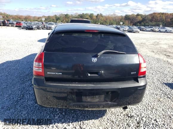 2005 Dodge Magnum SE z VIN 2D4FV48V15H128479, wystawiony jako Copart lot #82242724 z przebiegiem 261 270 mil mil oraz Szkoda całkowita • Salvage title. Historia ofert i sprzedaży dostępna na DreamBid. Obrazek 6.