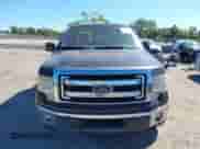 2014 Ford F-150 XLT z VIN 1FTEW1CMXEFA71588, wystawiony jako IAAI lot #43438706 z przebiegiem 254 035 mil mil oraz . Historia ofert i sprzedaży dostępna na DreamBid. Obrazek 12.
