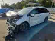 2023 Honda Odyssey Elite с VIN 5FNRL6H91PB004560, выставлен на аукционе Copart как лот 64805815 с пробегом Не указан миль и Списание • Salvage title. История ставок и продаж доступна на DreamBid. Изображение 1.