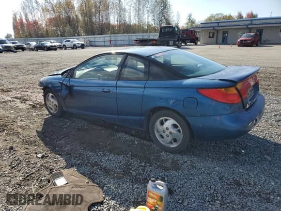 2002 Saturn SC с VIN 1G8ZY14762Z129155, выставлен на аукционе Copart как лот 75820394 с пробегом 199 847 миль миль и Списание • Salvage title. История ставок и продаж доступна на DreamBid. Изображение 2.