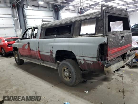 2000 Dodge 2500 с VIN 1B7KF23W1YJ164933, выставлен на аукционе Copart как лот 49051225 с пробегом Не указан миль и Списание • Salvage title. История ставок и продаж доступна на DreamBid. Изображение 2.