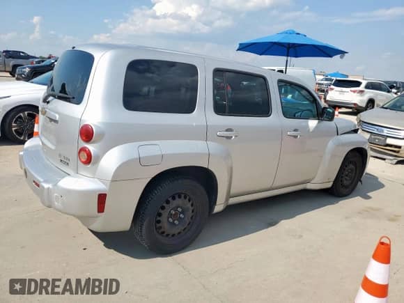 2010 Chevrolet HHR LS with VIN 3GNBAADB2AS505336, listed as a Copart auction lot 71270535 with 128,208 mi miles and Salvage title. Bid and sale history available at DreamBid. Image 3.