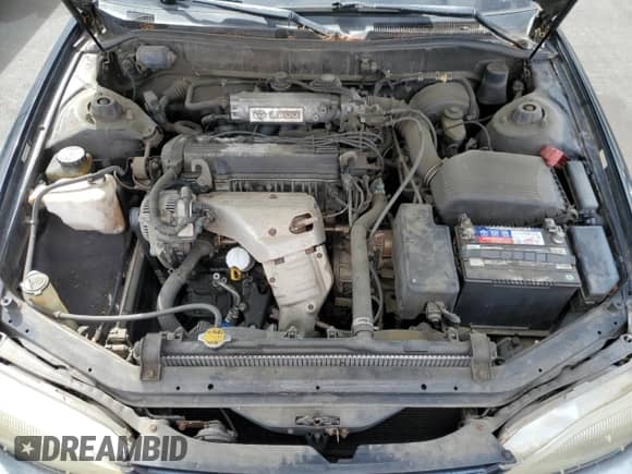 1995 Toyota Camry LE z VIN JT2SK12E6S0324261, wystawiony jako Copart lot #84645555 z przebiegiem 237 492 mil mil oraz Czysty tytuł • Clean title. Historia ofert i sprzedaży dostępna na DreamBid. Obrazek 11.