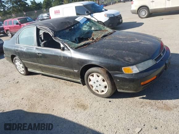 1997 Honda Accord LX with VIN 1HGCD5635VA220267, listed as a IAAI auction lot 43246438 with 260,776 mi miles and . Bid and sale history available at DreamBid. Image 1.