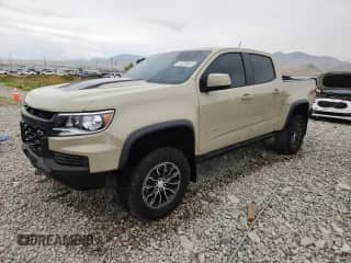 2021 Chevrolet Colorado 4WD ZR2 с VIN 1GCGTEENXM1245461, выставлен на аукционе Copart как лот 70220815 с пробегом 7 142 миль миль и Списание • Salvage title. История ставок и продаж доступна на DreamBid. Изображение 1.