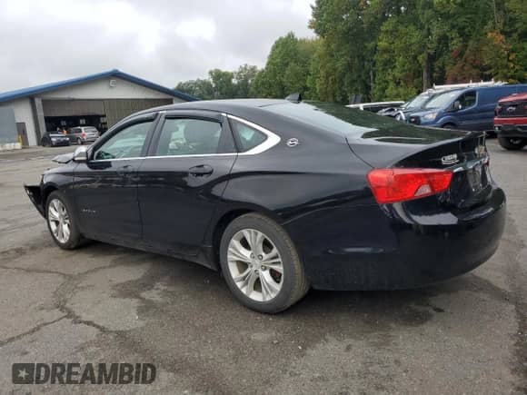 2014 Chevrolet Impala LT with VIN 1G1125S34EU170843, listed as a Copart auction lot 82053455 with 98,773 mi miles and Salvage title. Bid and sale history available at DreamBid. Image 2.