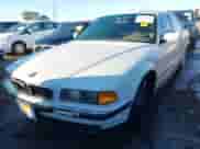 1996 BMW 7 Series 740iL z VIN WBAGJ8325TDL36633, wystawiony jako IAAI lot #41299652 z przebiegiem 166 420 mil mil oraz . Historia ofert i sprzedaży dostępna na DreamBid. Obrazek 6.