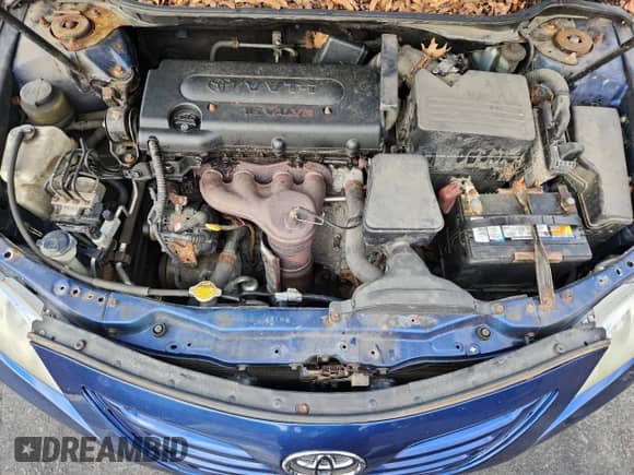 2007 Toyota Camry CE z VIN 4T1BE46K67U175653, wystawiony jako Copart lot #85743085 z przebiegiem 198 447 mil mil oraz Czysty tytuł • Clean title. Historia ofert i sprzedaży dostępna na DreamBid. Obrazek 11.