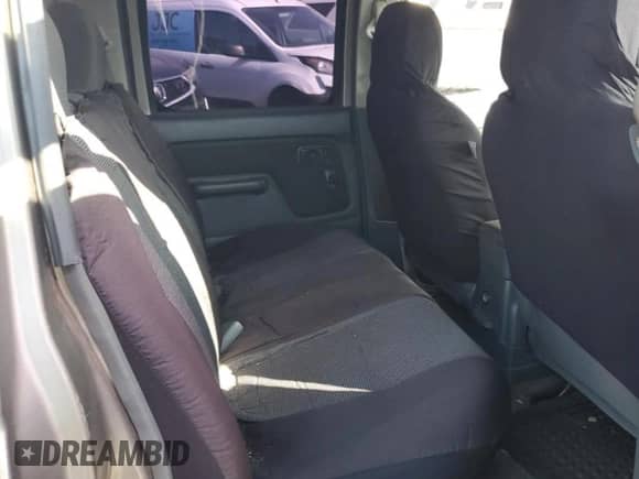 2004 Nissan Frontier XE z VIN 1N6ED29Y74C400170, wystawiony jako Copart lot #62711965 z przebiegiem 147 131 mil mil oraz Szkoda całkowita • Salvage title. Historia ofert i sprzedaży dostępna na DreamBid. Obrazek 10.