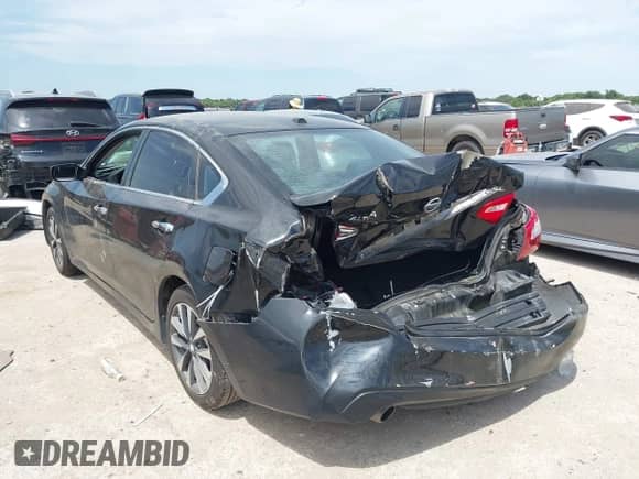 2016 Nissan Altima S with VIN 1N4AL3AP4GC266628, listed as a IAAI auction lot 42822655 with 155,584 mi miles and . Bid and sale history available at DreamBid. Image 3.