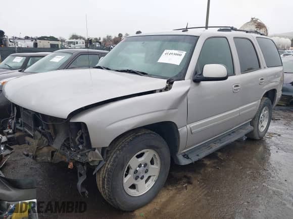 2005 Chevrolet Tahoe LS with VIN 1GNEC13T55J230697, listed as a IAAI auction lot 41493000 with 211,693 mi miles and . Bid and sale history available at DreamBid. Image 2.
