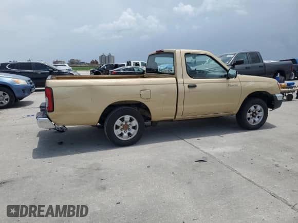 1998 Nissan Frontier XE z VIN 1N6DD21S4WC318399, wystawiony jako Copart lot #62965245 z przebiegiem Nie podano mil oraz Czysty tytuł • Clean title. Historia ofert i sprzedaży dostępna na DreamBid. Obrazek 3.