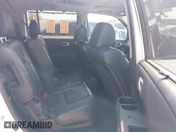 2015 Honda Pilot Touring с VIN 5FNYF3H92FB007774, выставлен на аукционе IAAI как лот 43083627 с пробегом 148 676 миль миль и . История ставок и продаж доступна на DreamBid. Изображение 8.