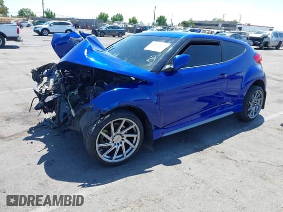 2014 Hyundai Veloster Turbo с VIN KMHTC6AE9EU201232, выставлен на аукционе IAAI как лот 42821023 с пробегом Не указан миль и . История ставок и продаж доступна на DreamBid. Изображение 2.