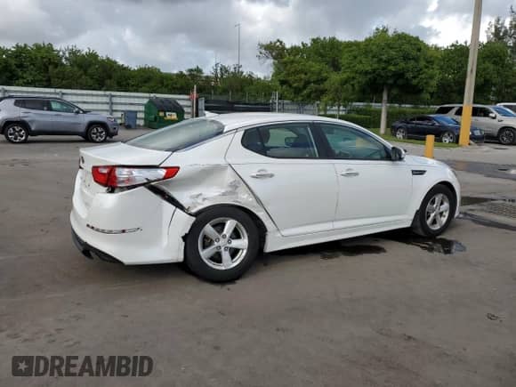 2015 Kia Optima LX с VIN KNAGM4A74F5566466, выставлен на аукционе Copart как лот 81994485 с пробегом 12 164 миль миль и Списание • Salvage title. История ставок и продаж доступна на DreamBid. Изображение 3.