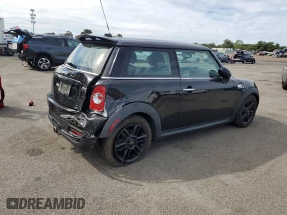 2013 MINI Hardtop S с VIN WMWSV3C55DT392378, выставлен на аукционе Copart как лот 80446575 с пробегом 69 242 миль миль и Списание • Salvage title. История ставок и продаж доступна на DreamBid. Изображение 3.