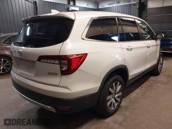 2021 Honda Pilot EX with VIN 5FNYF6H3XMB079395, listed as a IAAI auction lot 41882789 with 37,662 mi miles and . Bid and sale history available at DreamBid. Image 4.