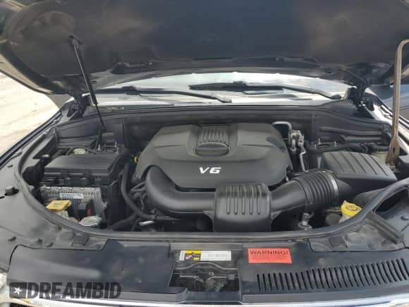 2014 Dodge Durango SXT with VIN 1C4RDJAG5EC539717, listed as a Copart auction lot 70519855 with 116,632 mi miles and Salvage title. Bid and sale history available at DreamBid. Image 12.