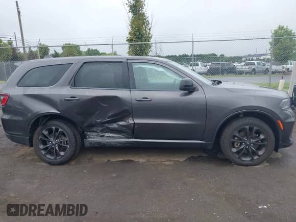 2021 Dodge Durango SXT Plus with VIN 1C4RDJAG2MC792637, listed as a IAAI auction lot 43026771 with 105,808 mi miles and . Bid and sale history available at DreamBid. Image 13.