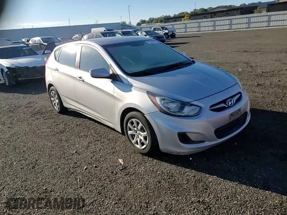 2012 Hyundai Accent GS z VIN KMHCT5AE3CU047639, wystawiony jako Copart lot #71948075 z przebiegiem 145 191 mil mil oraz Szkoda całkowita • Salvage title. Historia ofert i sprzedaży dostępna na DreamBid. Obrazek 13.