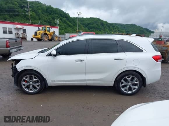 2016 Kia Sorento SXL z VIN 5XYPKDA57GG174551, wystawiony jako IAAI lot #42314487 z przebiegiem 86 606 mil mil oraz . Historia ofert i sprzedaży dostępna na DreamBid. Obrazek 15.