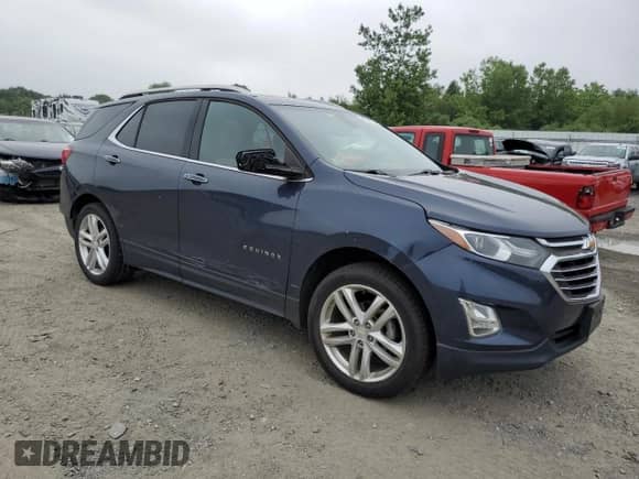 2018 Chevrolet Equinox Premier with VIN 3GNAXVEV7JL174306, listed as a Copart auction lot 60219475 with 80,679 mi miles and Salvage title. Bid and sale history available at DreamBid. Image 4.