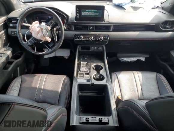 2025 Honda Pilot Black Edition с VIN 5FNYG1H98SB031766, выставлен на аукционе Copart как лот 58893515 с пробегом 17 943 миль миль и Списание • Salvage title. История ставок и продаж доступна на DreamBid. Изображение 8.