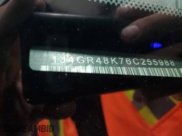 2006 Jeep Grand Cherokee Laredo with VIN 1J4GR48K76C255988, listed as a Copart auction lot 68521495 with 171,036 mi miles and Salvage title. Bid and sale history available at DreamBid. Image 13.