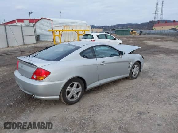 2004 Hyundai Tiburon GS с VIN KMHHM65D24U135433, выставлен на аукционе IAAI как лот 41001291 с пробегом Не указан миль и . История ставок и продаж доступна на DreamBid. Изображение 4.